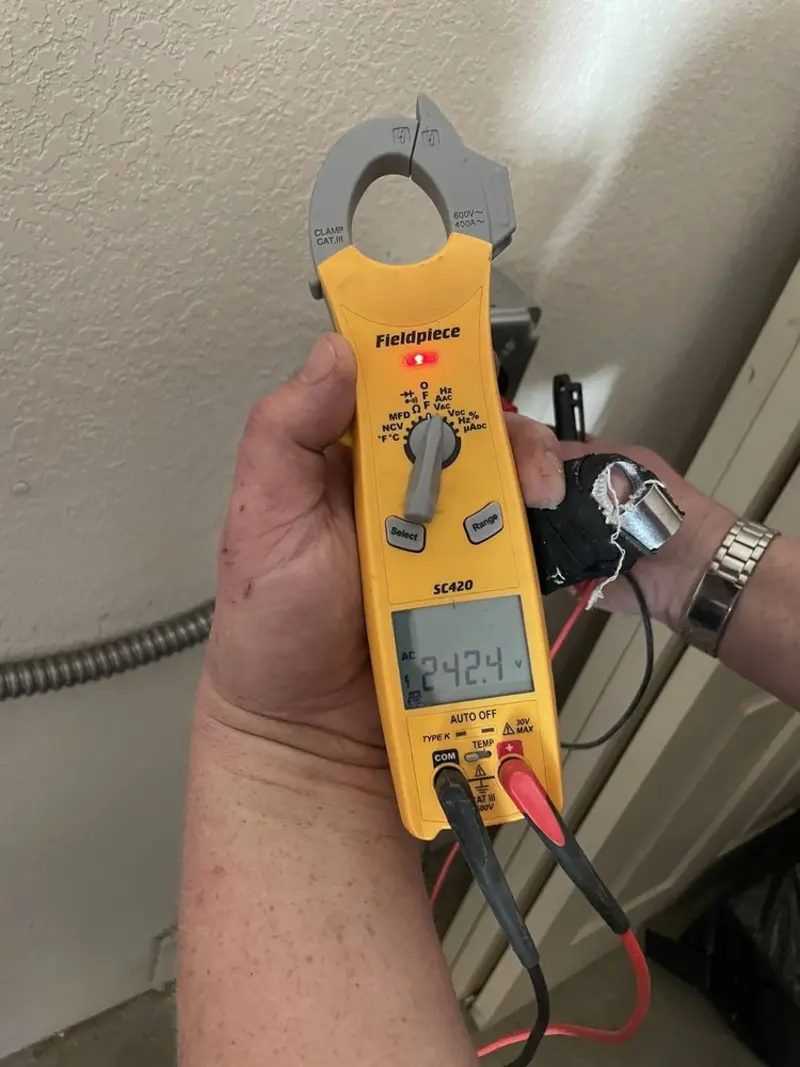Voltage testing with clamp meter during Recessed Lighting Installation in Sun City